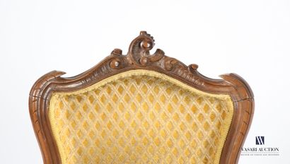null Pair of moulded and carved walnut bedroom chairs, the back decorated with scrolling...