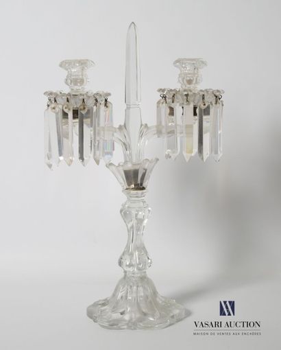 null Pair of crystal candlesticks, the shaft godronné ending in obelisk and resting...