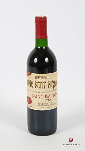 null 1 bouteille	Château FRANC PETIT FIGEAC	St Emilion	1990
	Et. tachée. N : bas...