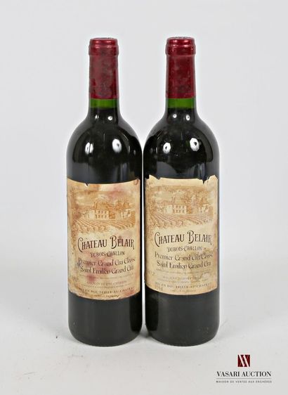null *2 bottles Château BELAIR St Emilion 1er GCC 2002
	Faded, stained and a little...