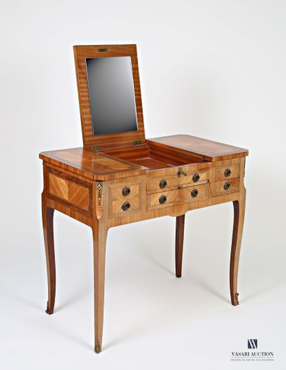 null Dressing table in rosewood veneer inlaid with leaf in frames of net, the tray...