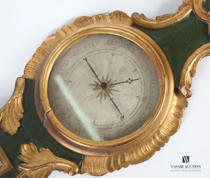 null Barometer in wood and stucco molded carved, green patina and golden highlights,...