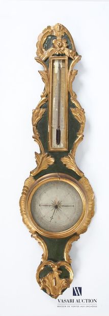 null Barometer in wood and stucco molded carved, green patina and golden highlights,...