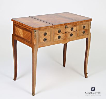 null Dressing table in rosewood veneer inlaid with leaf in frames of net, the tray...