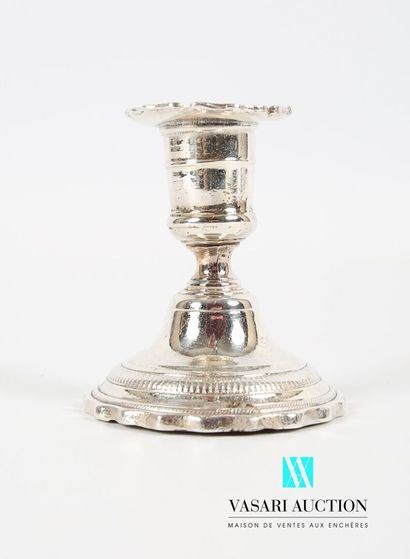 null Candlestick of toilet in silver plated bronze posing on a round base hemmed...