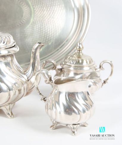null Tea and coffee set in alpacca standing on four feet, the baluster body decorated...