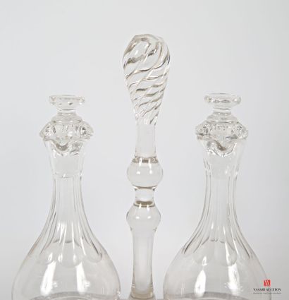 null A crystal lot including an oil and vinegar cruet on a hemmed base, it supports...