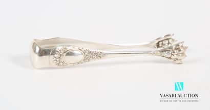 null Silver sugar tongs, the arms have medallions, one of which is numbered in a...