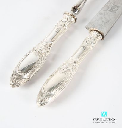null Cutlery for carving, the handle in filled silver decorated with blind reserves...