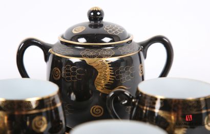 null CHINA
Tea service in porcelain with black background and gilded decoration of...