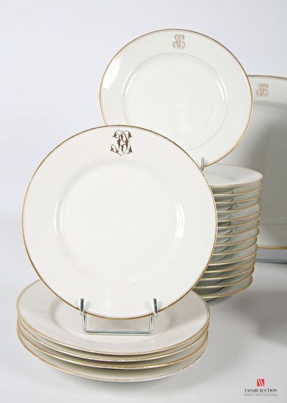null Set in white porcelain and gold filets, numbered including fifteen dinner plates...