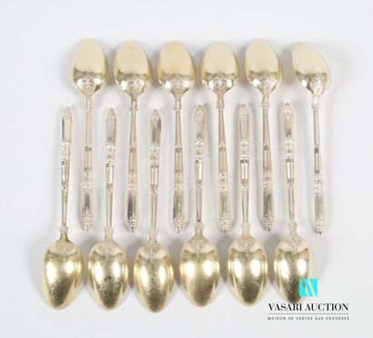 null Suite of twelve silver plated tea spoons, the handle in the Russian style with...