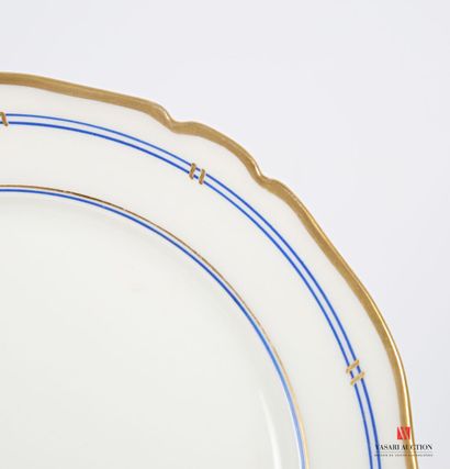 null Part of a white porcelain service, the wing decorated with blue and gold nets,...