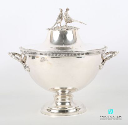 null Soup tureen of round form and its lid in silver posing on a pedestal base hemmed...