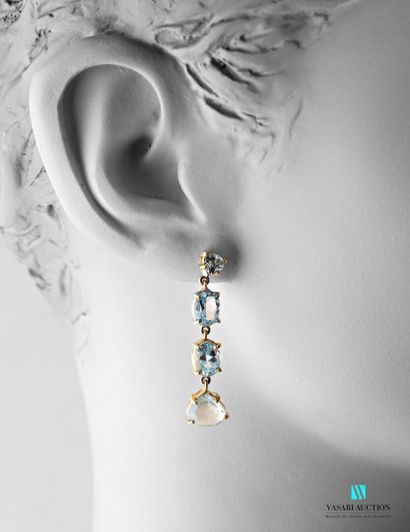 null Pair of gilded silver earrings decorated with blue topaz and aquamarines.
(cracks)
Gross...