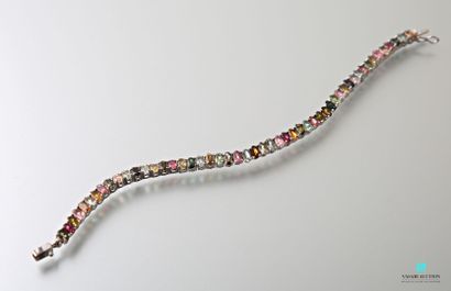 null Silver line bracelet set with multicolored tourmalines, clasp with eight safety.
(defect...
