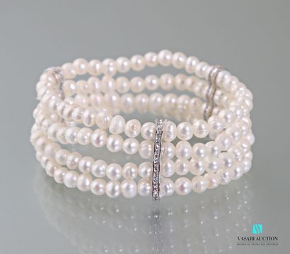 null Bracelet with four rows of freshwater pearls embellished with rhinestone ba...