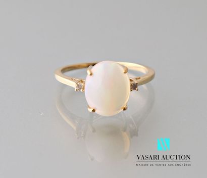 null Ring in vermeil 925 thousandths decorated with an opal cabochon calibrating...
