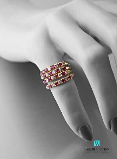 null Ring in yellow gold 750 thousandths formed by four rings set with four rubies...