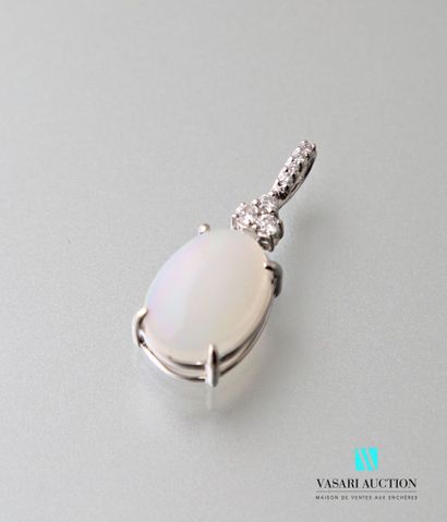null White gold pendant set with a cabochon-cut opal weighing approximately 3 carats,...