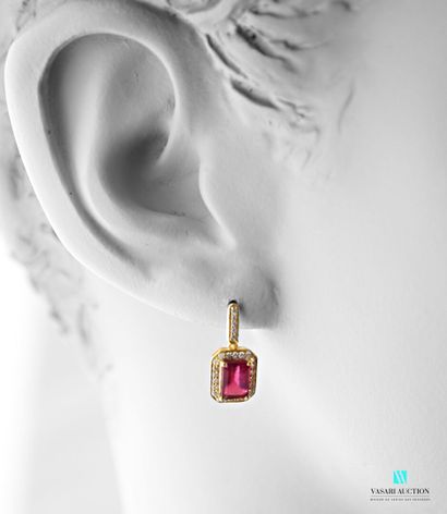null Earrings in vermeil set with emerald-cut rubies hemmed with zircons, the clasps...