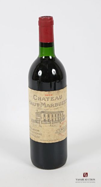 null 1 bouteille	Château HAUT MARBUZET	St Estèphe	1994
	Et. tachée. N : bas goulot/...