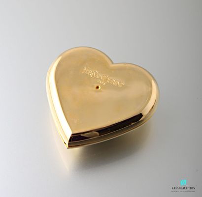 null Yves SAINT LAURENT 
Poudrier en forme de coeur en métal doré orné d'un cabochon...
