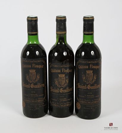 null 3 bouteilles	Château FLOUQUET	St Emilion	
	1 blle de 1971, 2 blles de 1970.		
	Et....
