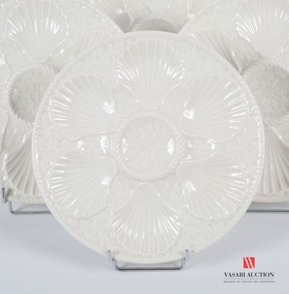 null LONGCHAMP
Suite of six white earthenware seafood plates with six receptacles...