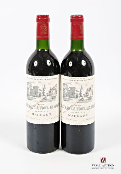 null 2 bouteilles	Château LA TOUR DE MONS	Margaux	1985
	Et. légèrement tachées. N...