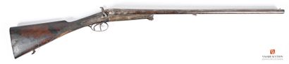 null Shotgun caliber 16/65, central percussion by external hammers, barrels in table...