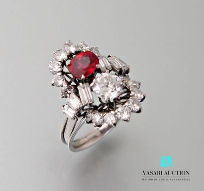 null 850 thousandth platinum ring set with a red stone and brilliant-cut and baguette-cut...