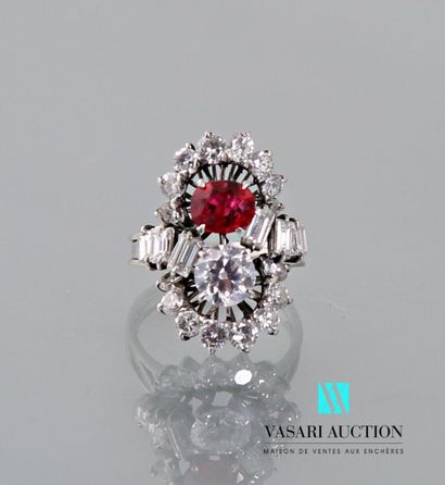 null 850 thousandth platinum ring set with a red stone and brilliant-cut and baguette-cut...