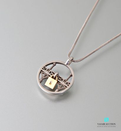 null An Amor et Baci 925 thousandths silver snake chain and a round silver pendant...