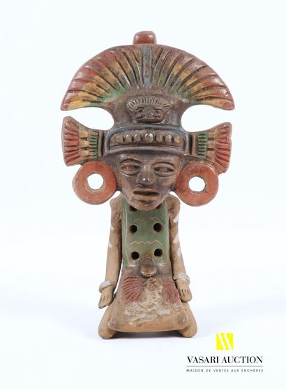 null Flûte en terre cuite polychrome représentant un aztèque agenouillé. 
(usure...