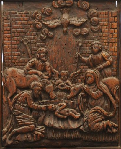 null Bas-relief
en bois naturel teinté représentant la Nativité.
XVIIIème siècle
Haut....