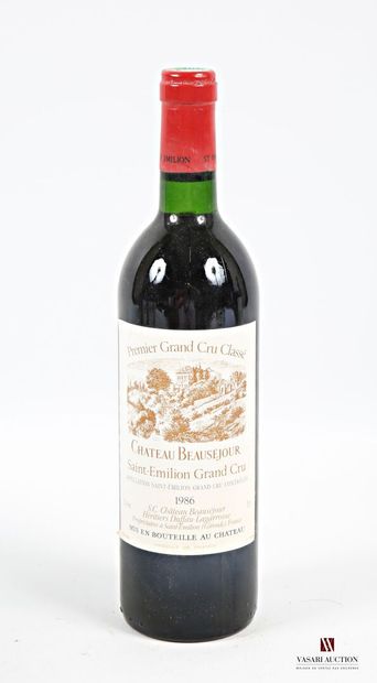 null 1 bouteille	Château BEAUSÉJOUR	St Emilion 1er GCC	1986
	Et. un peu tachée. N...