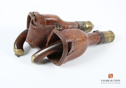 null Pair of tan leather cavalry fonts with engraved brass tips, containing two model...