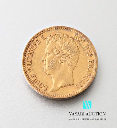 null A 20-franc gold coin depicting Louis Philippe Ie, bare head, engraved by Tiollet,...