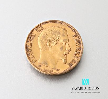 Une pièce en or de 20 francs figurant Napoléon...