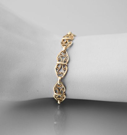 null Flexible bracelet in 750 thousandths gold with openwork and filigree links,...