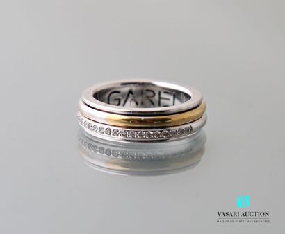 null Garel in Paris, a ring in yellow and white gold 750 thousandths, wide band embellished...