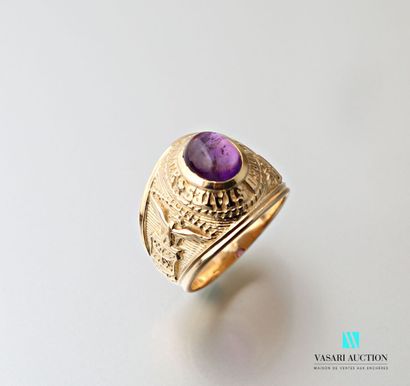 null University style signet ring in 750 thousandths yellow gold set with a cabochon...