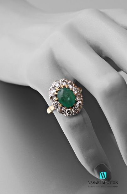 null Yellow gold 750 thousandths and white gold pompadour ring set with an emerald...