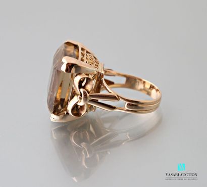 null 50's ring in yellow gold 750 thousandths, the sides with a stylized ribbon bow...