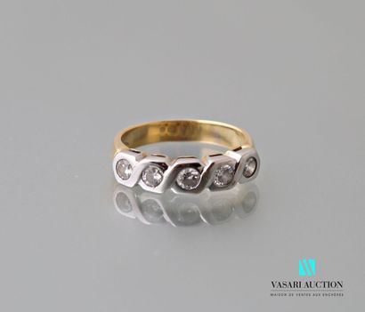 null Half wedding band in yellow and white gold 750 thousandths set with five diamonds...