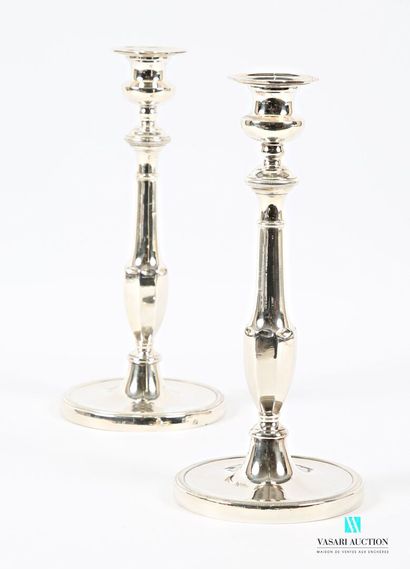 null Pair of silver-plated torches standing on a round base hemmed with gadroons,...