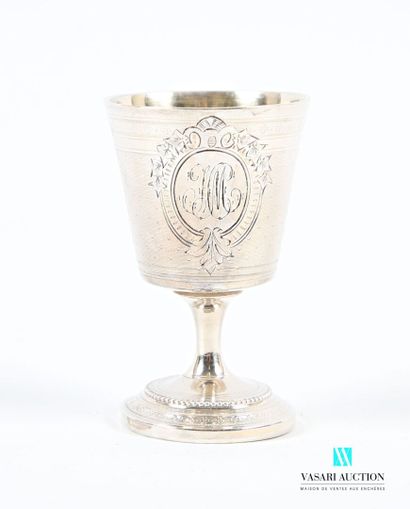 null Egg cup in 950-thousandths silver on a round base hemmed with a frieze of trefoils...