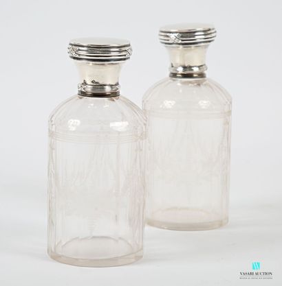 null Pair of tubular glass flasks cut with cut sides and engraved with garlands of...