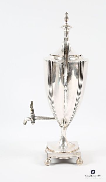 null Silver-plated metal tea fountain standing on four ball feet supporting a square...